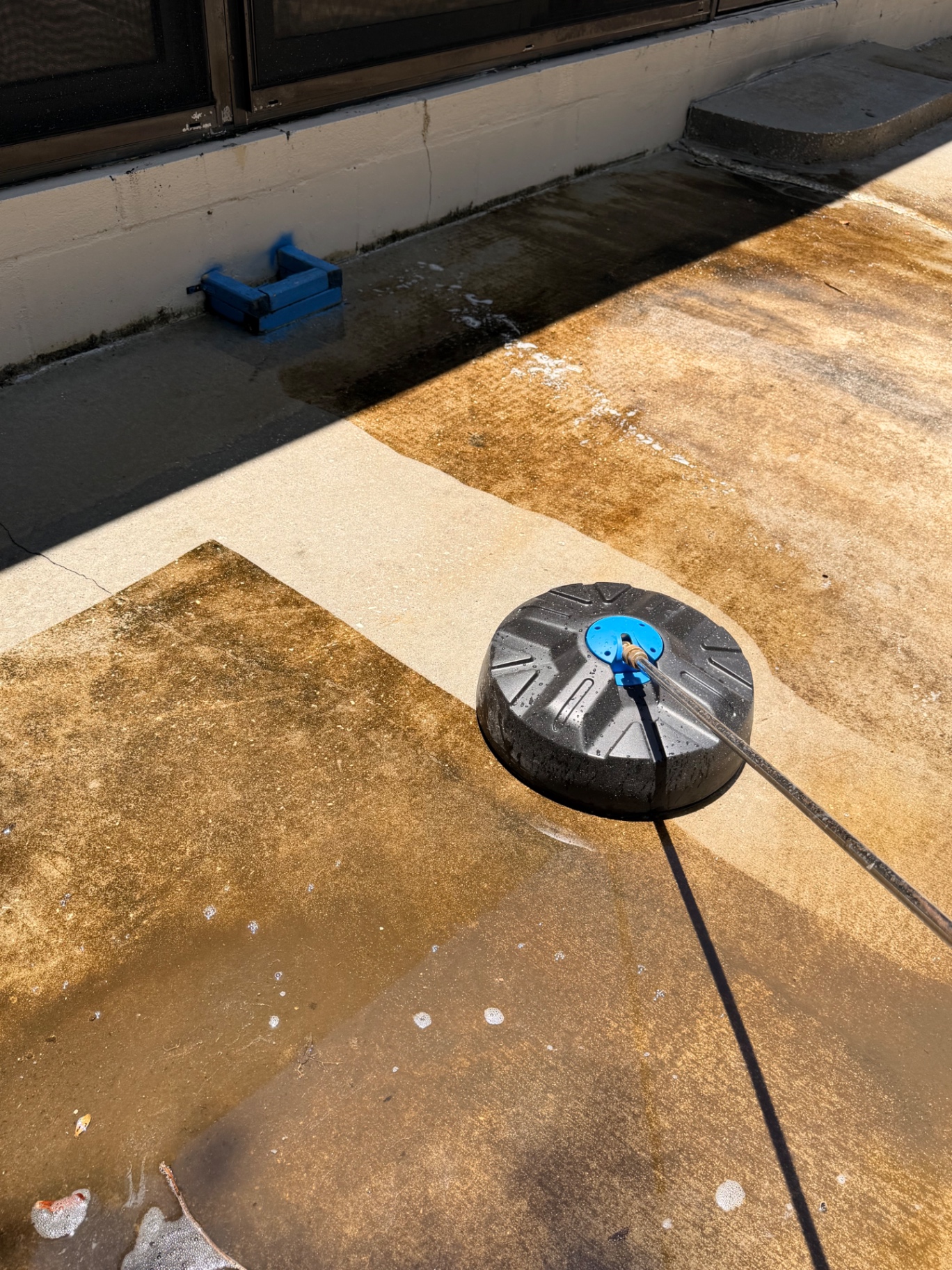 Driveway surface cleaner in action