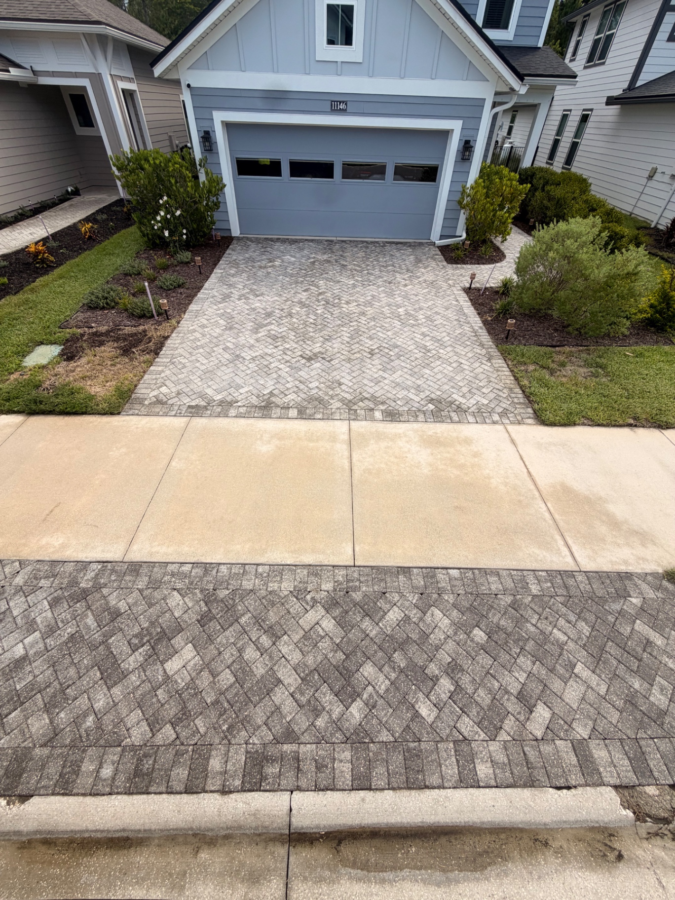 Paver driveway pressure washed clean